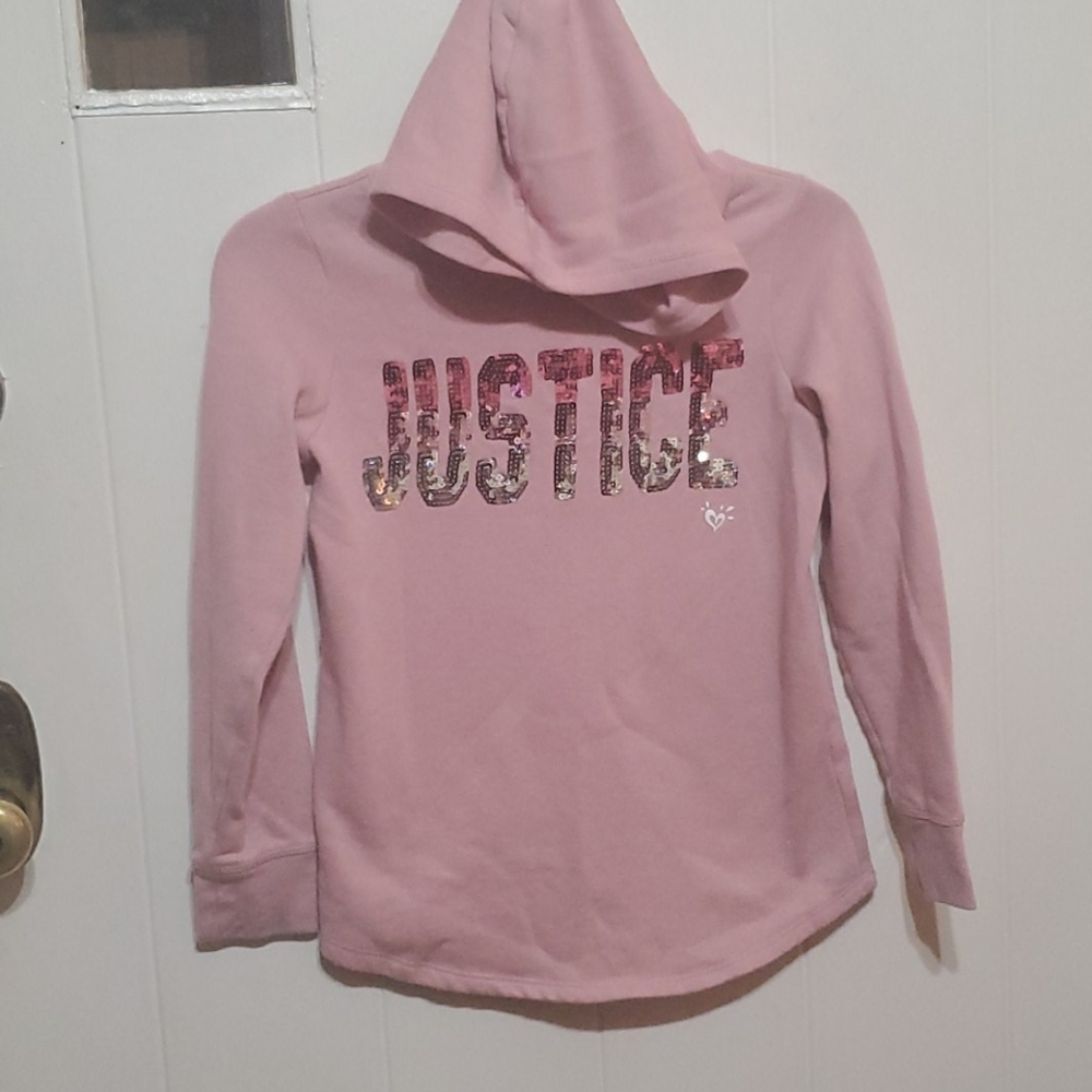 A pink Justice girls hooded sweatshirt